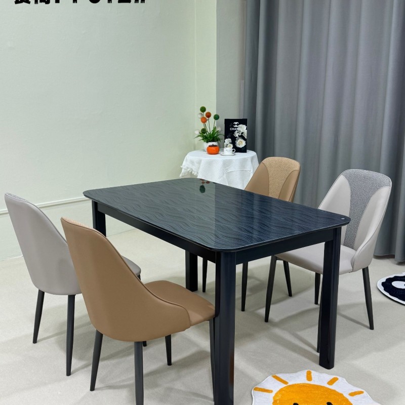 轻奢风西餐桌906# ​台面：雪菱黑玻 ​椅子：F012# F025# 软包椅子